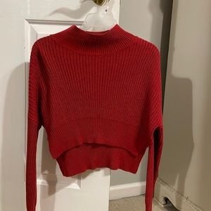 Red cropped turtleneck sweater